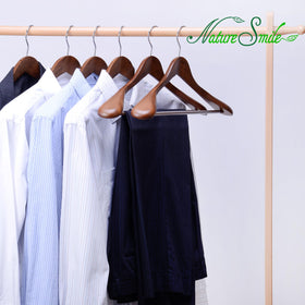 Nature Smile extra-wide-shoulder-design hanger supports heavy garments and preserves shape.