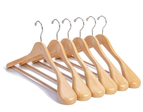 Nature Smile luxury wooden suit hangers with glossy finish elevating closet presentation.