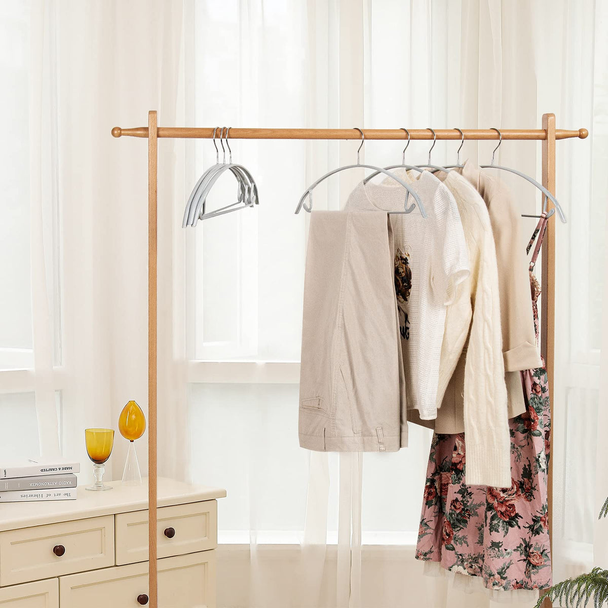Nature Smile multi-function hangers accommodate coats, sweaters, scarves, belts, and more