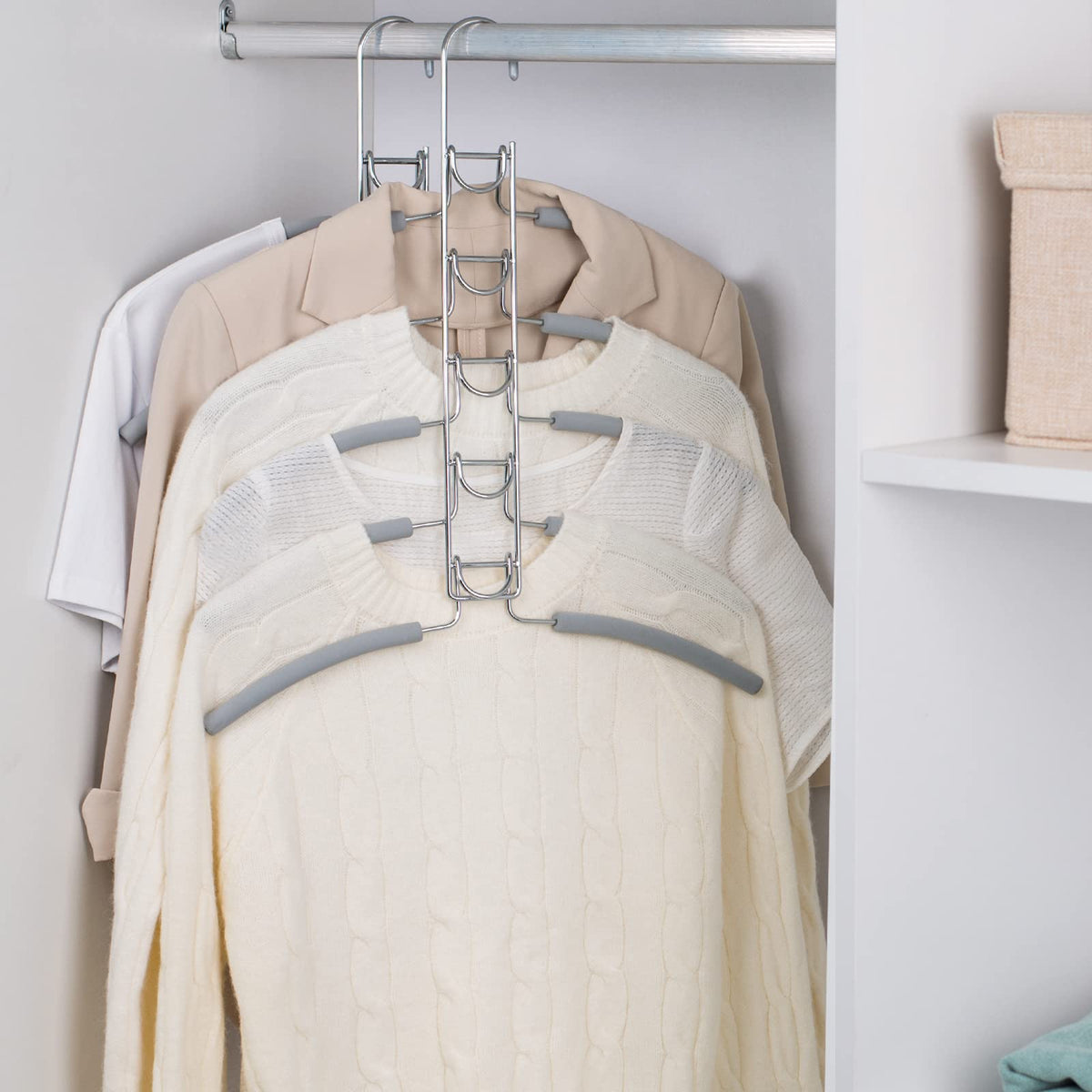 Nature Smile No Shoulder Bump hangers with multi-layer design keeps coats organized.