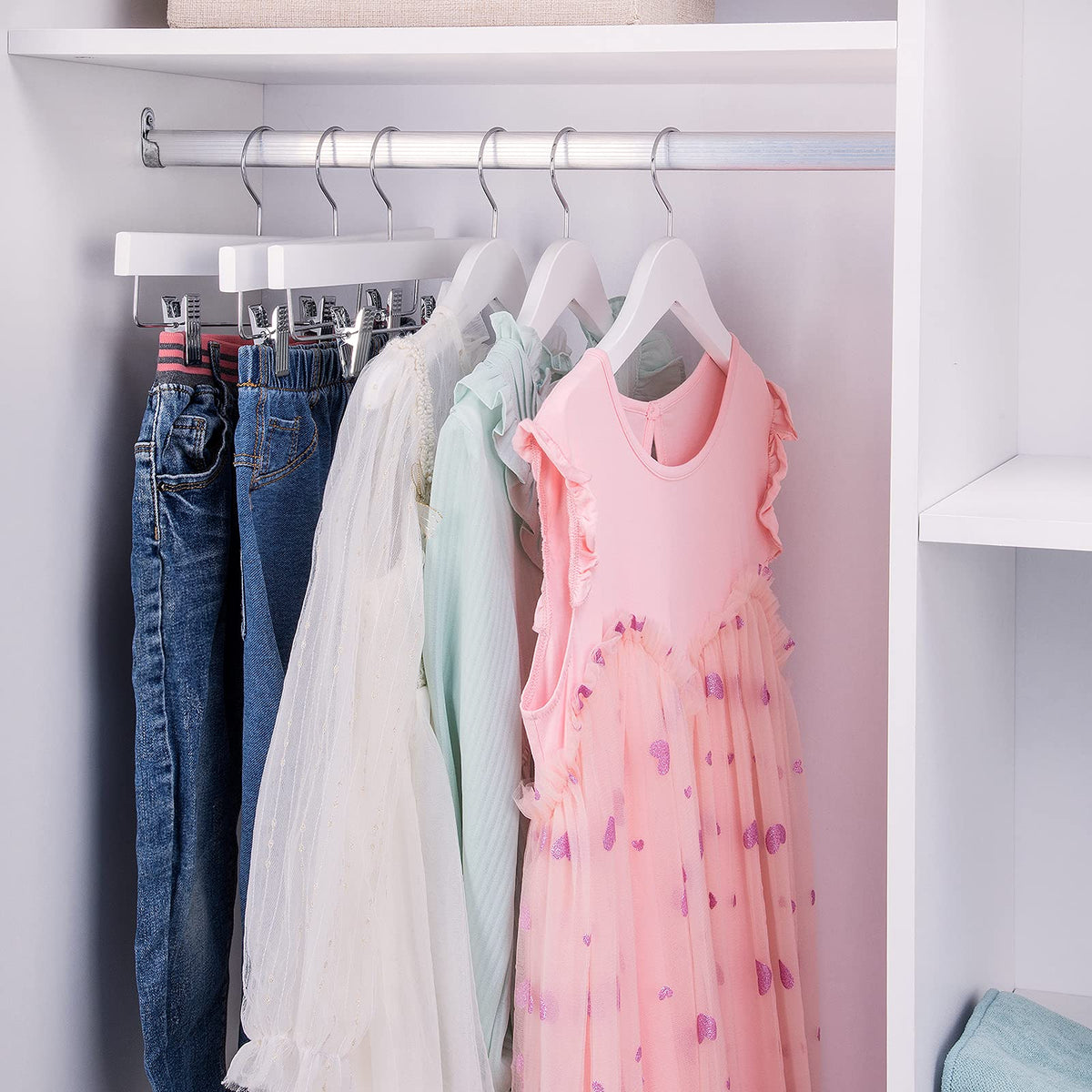 Nature Smile pack of 10 premium wooden hangers simplifies closet organization.