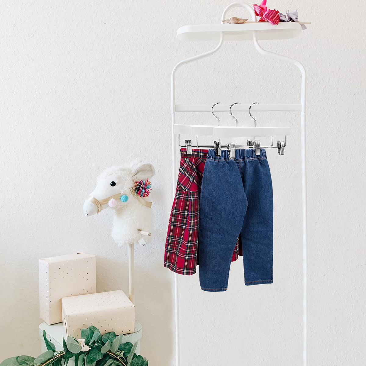 Nature Smile pack of 10 wooden hangers, great for kids' wardrobes.