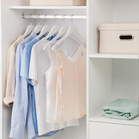 Nature Smile wardrobe organizers enhance closet aesthetics with a sleek white finish.