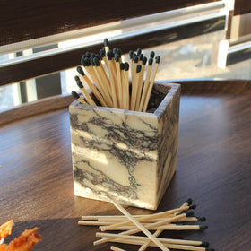 Natust marble toothbrush holder in bathroom, showcasing unique Calacatta Viola pattern