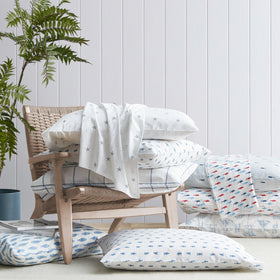 Nautica whale-stripe design bedding adds coastal charm to any room.