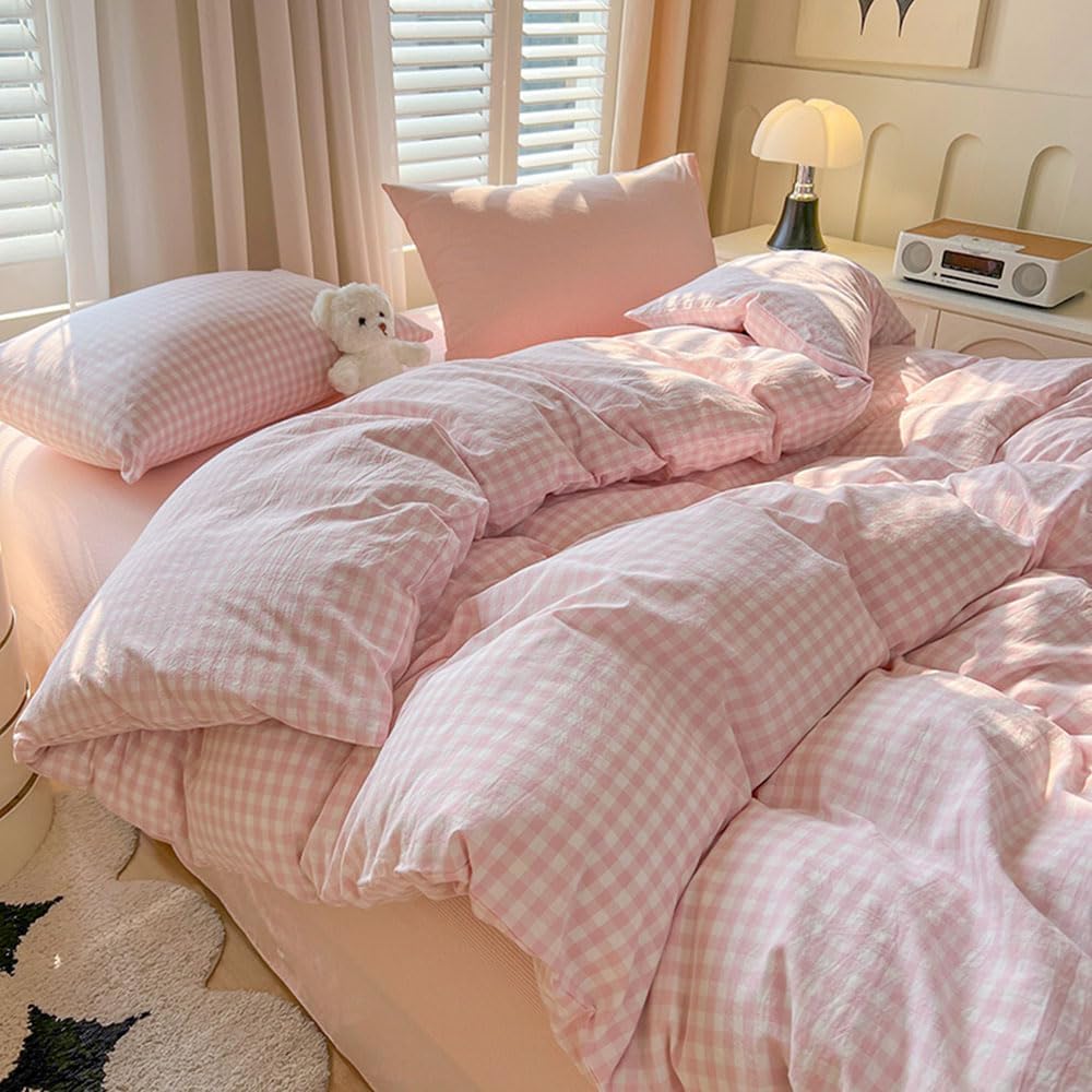 Nayoroom pillow shams in pink gingham add coordinated style and easy pillow replacement.