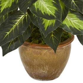 Close-up shows craftsmanship and realistic textures of the artificial plant.