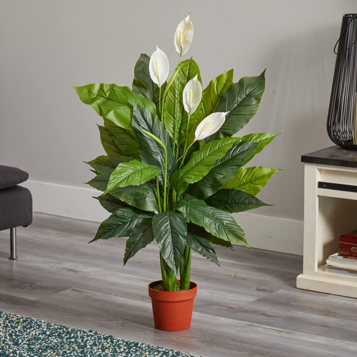Nearly Natural Peace Lily 42in floor stand elevates spaces with a lifelike silhouette.