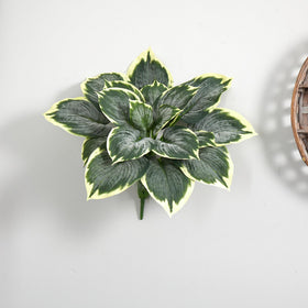 Close-up of lifelike variegated leaves showing texture.