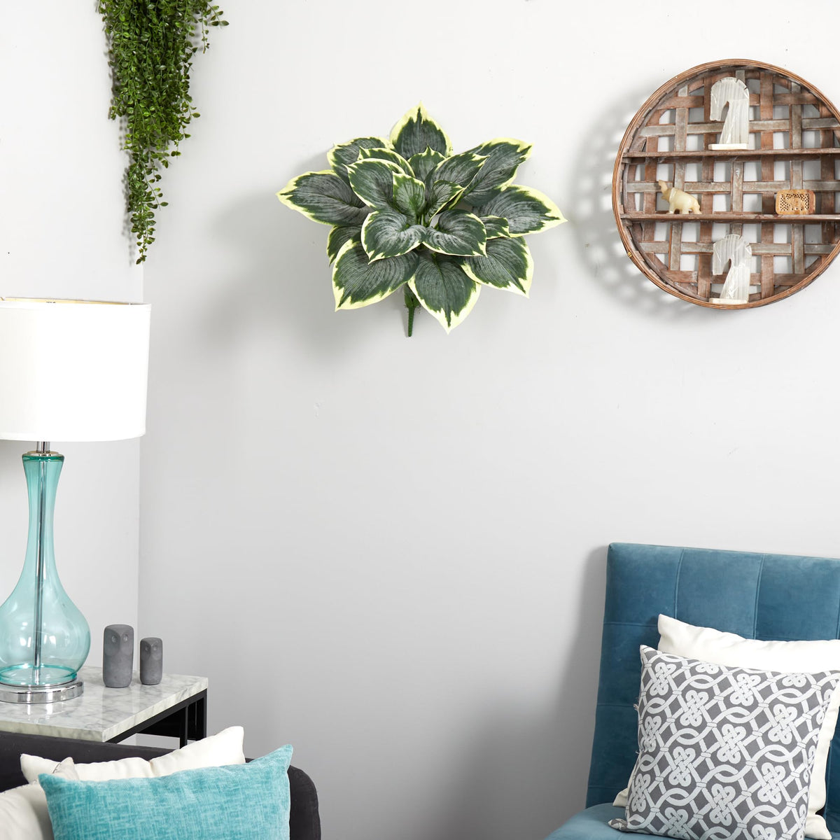 Hosta arrangement in a brown planter enhances reading nook ambiance.