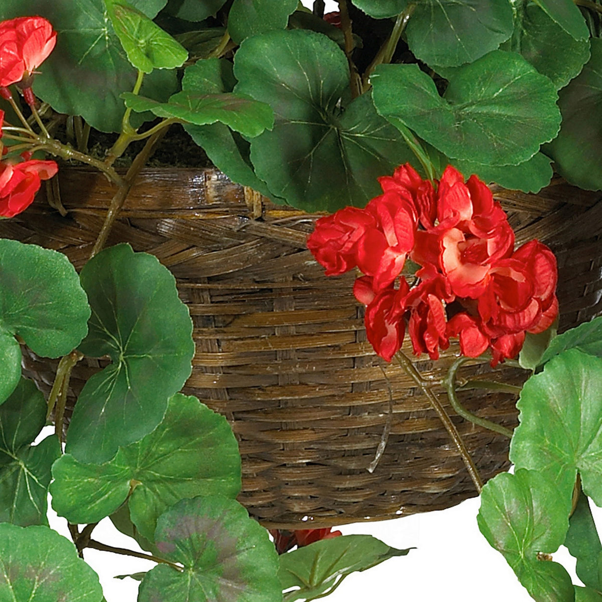 Nearly Natural geranium leaves and blooms display on wicker planter, ideal for shelf display.