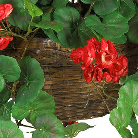 Nearly Natural geranium leaves and blooms display on wicker planter, ideal for shelf display.