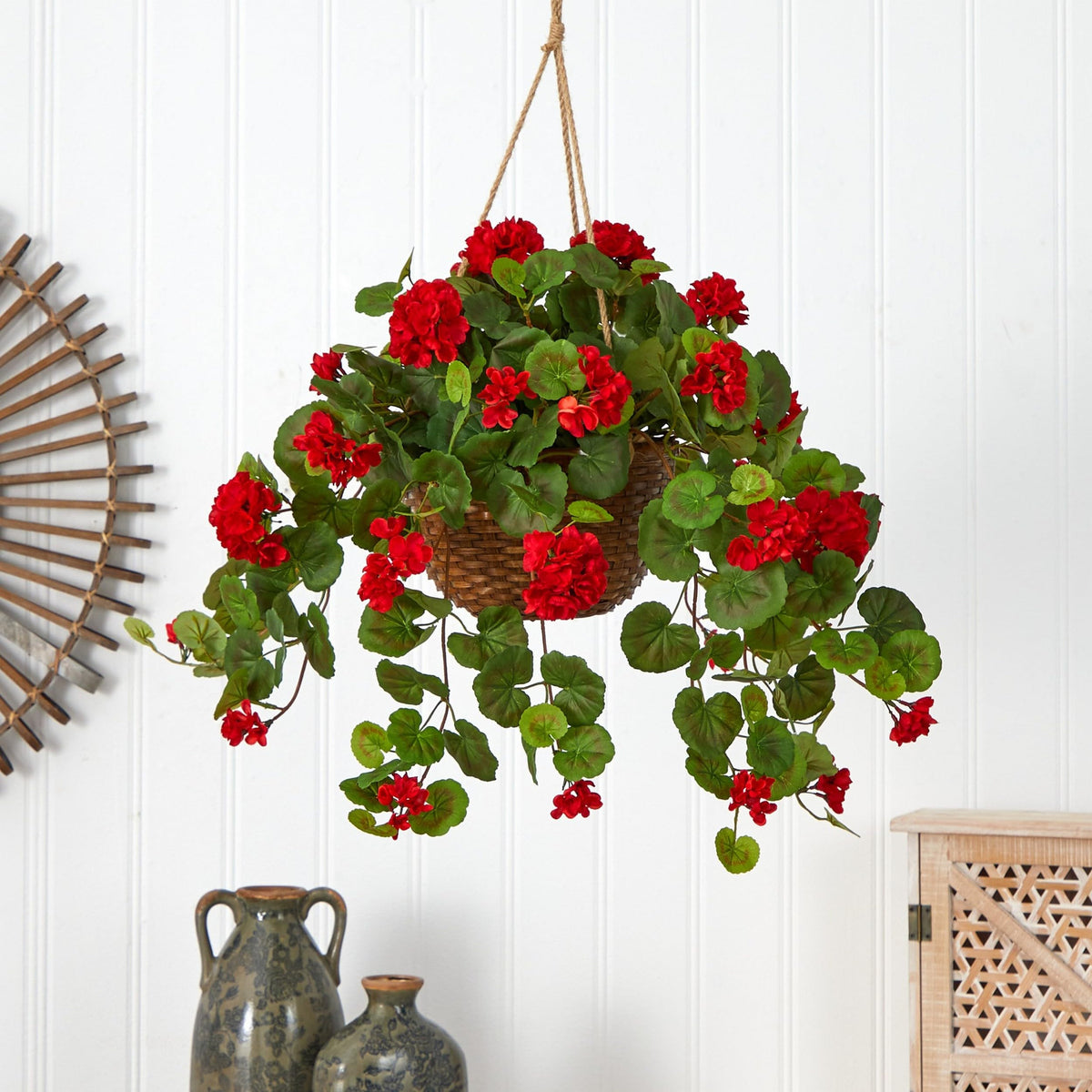 Nearly Natural hanging basket close-up of vivid red petals and leaves for indoor display.