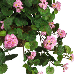Nearly Natural wicker planter setup with pink blooms.