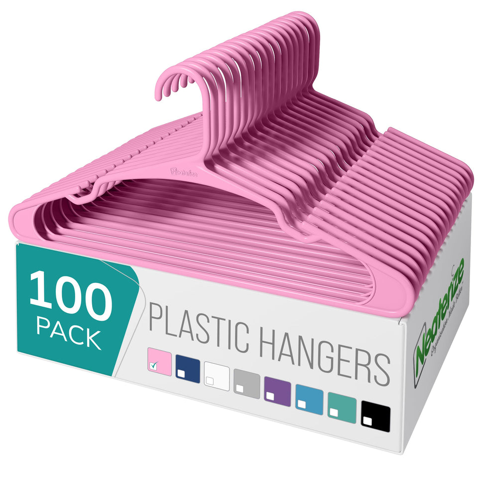 NEATERIZE pink plastic hanger with angled shoulder support for dresses and suits.