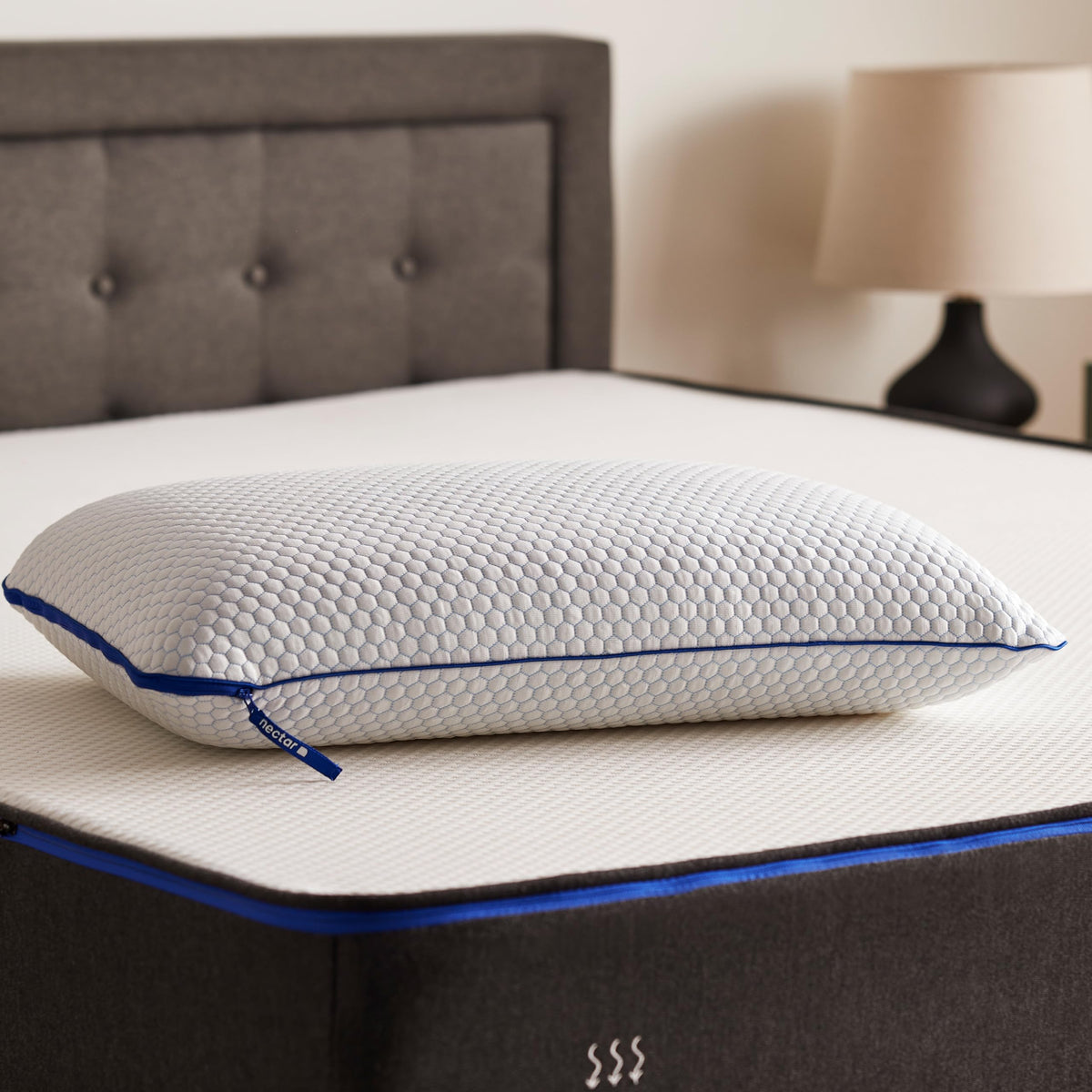 Nectar Tri-Comfort Pillow front view on bed showing plush support