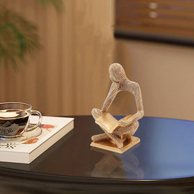 Neeenn Sparkling Gold Reading Woman makes a thoughtful gift for art lovers.