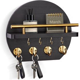 Nekon key holder wall-mount circle shelf with eight hooks in black and gold finish.