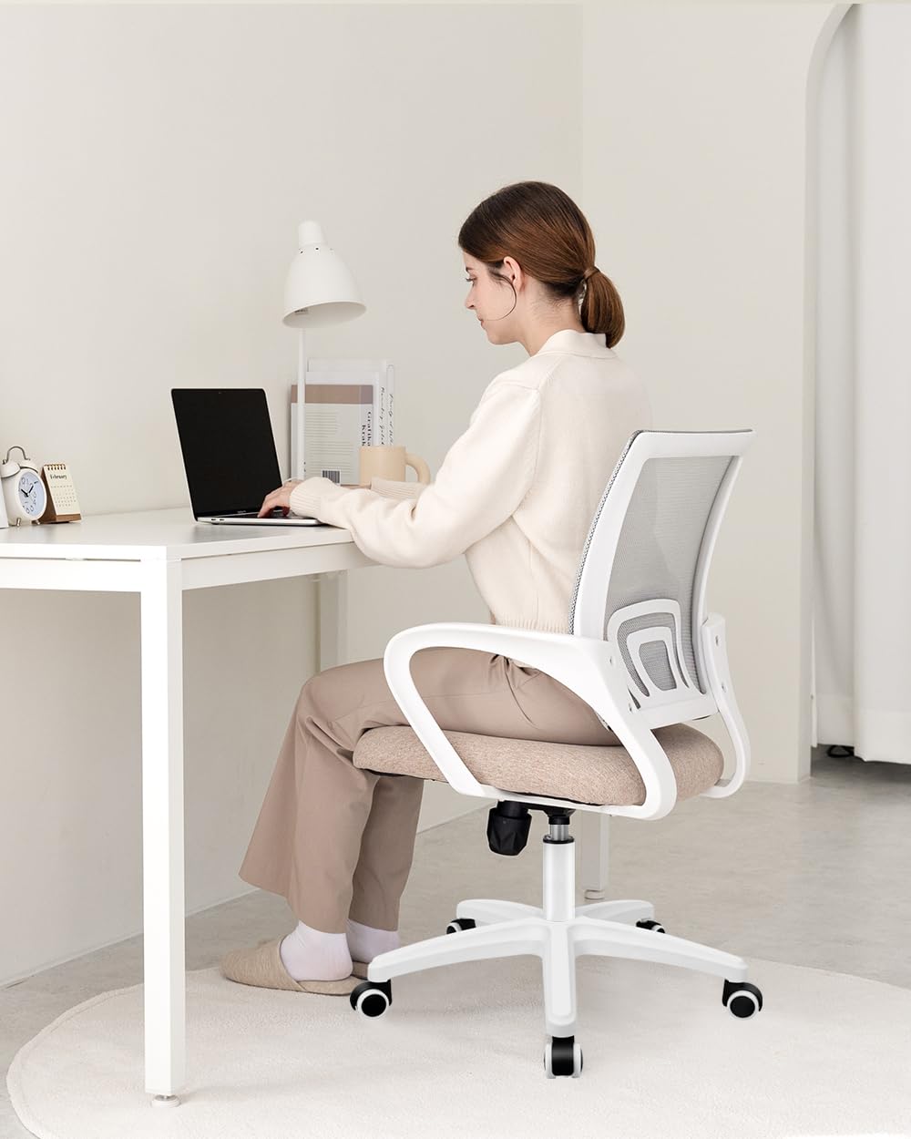 NEO CHAIR beige home office setup complements contemporary workspaces.