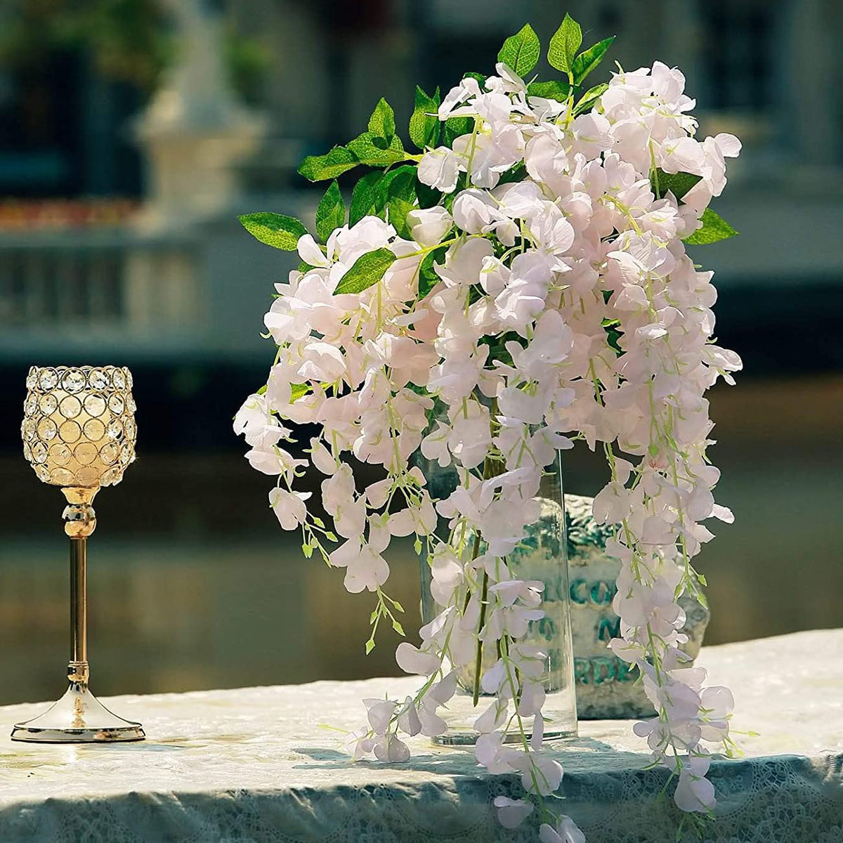 NEOONES wisteria garland centerpiece-ready giving tables a lush natural look.