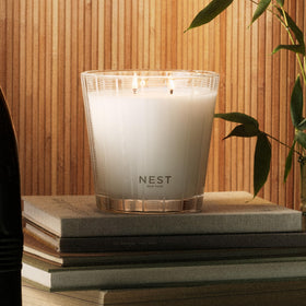 Nest New York Bamboo 3-Wick Candle featuring floral-citrus bouquet fills rooms with fresh notes.
