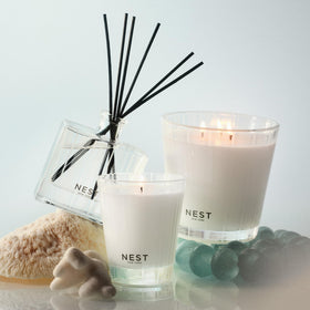 NEST New York votive glass vessel adds elegant decor and sustainable burn.