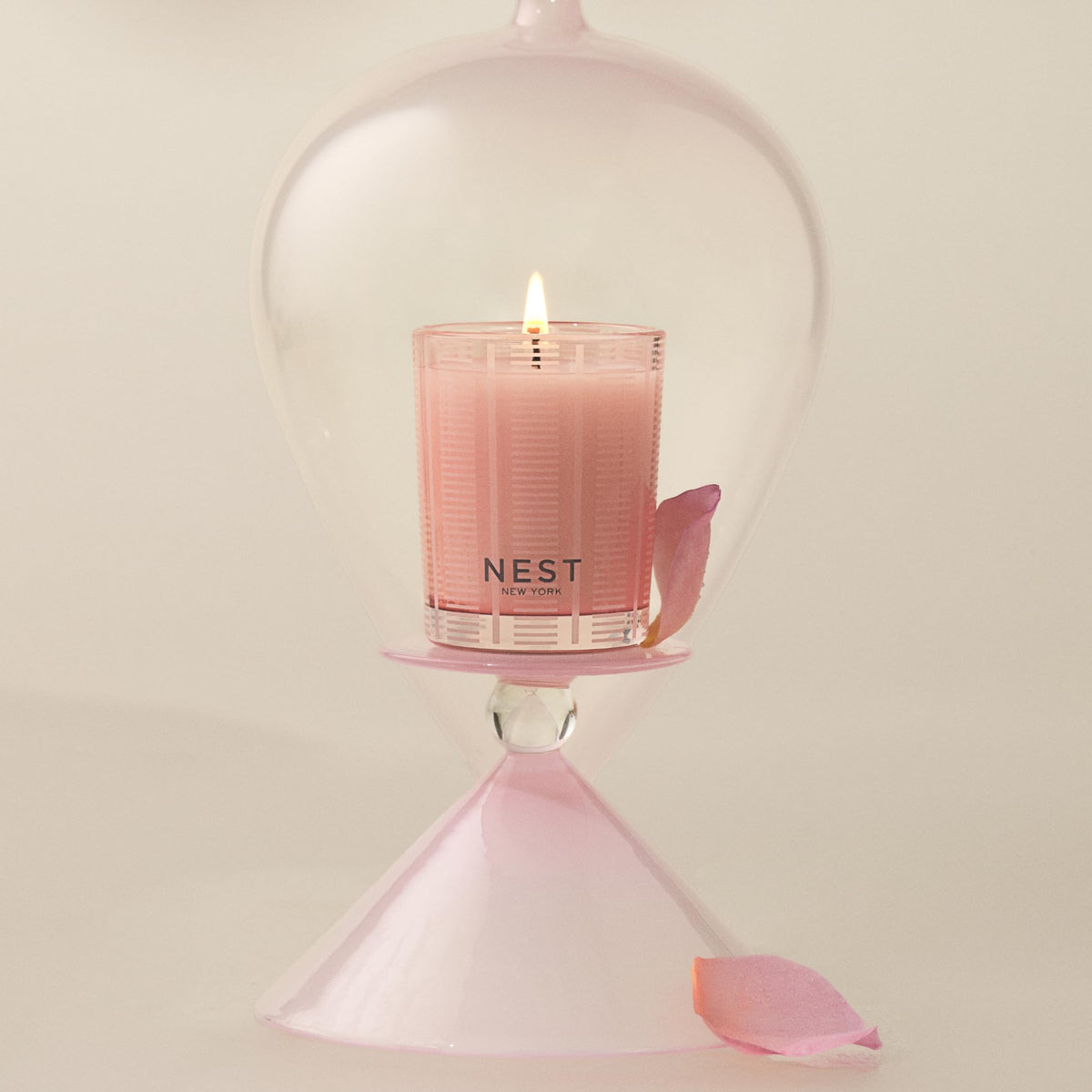 NEST New York pink-tinted wax votive featuring etched frosted stripes for elegance