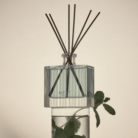 Nest New York reed diffuser glass holder is reusable and stylish.