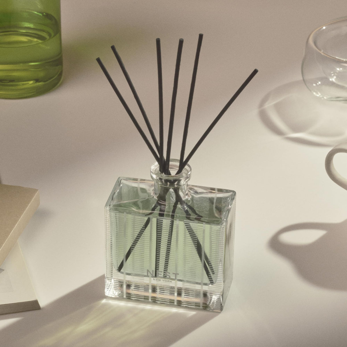 Nest New York diffuser glass vessel showcases a clean, flame-free design.
