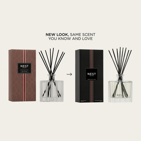 Nest New York diffuser with eight natural reeds spreading continuous fragrance