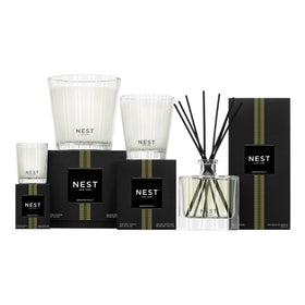 Nest New York Grapefruit candle enhancing dining room ambiance