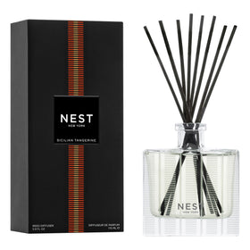 NEST New York Sicilian Tangerine diffuser in glass vessel delivering lasting fragrance.