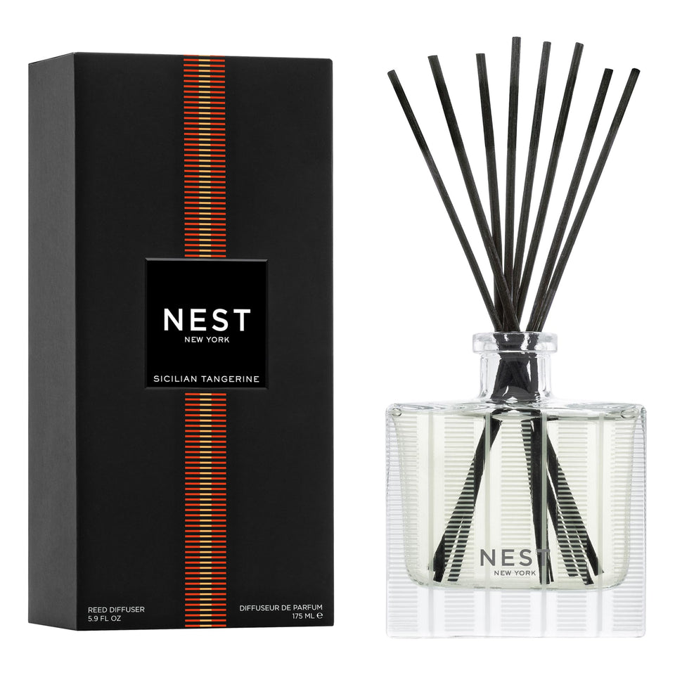 NEST New York Sicilian Tangerine diffuser in glass vessel delivering lasting fragrance.