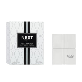 Nest New York wall diffuser device front view, easy plug-in setup for flame-free fragrance