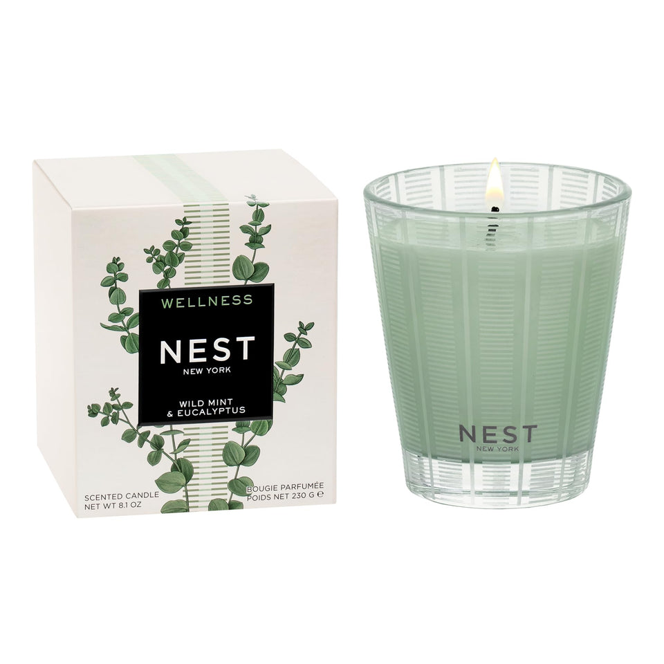 NEST New York Wild Mint & Eucalyptus candle in sage glass, ready to scent your space.