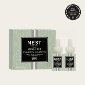 Nest New York Wild Mint and Eucalyptus refill vial for NEST x Pura 4 diffusers, enabling scent transitions.