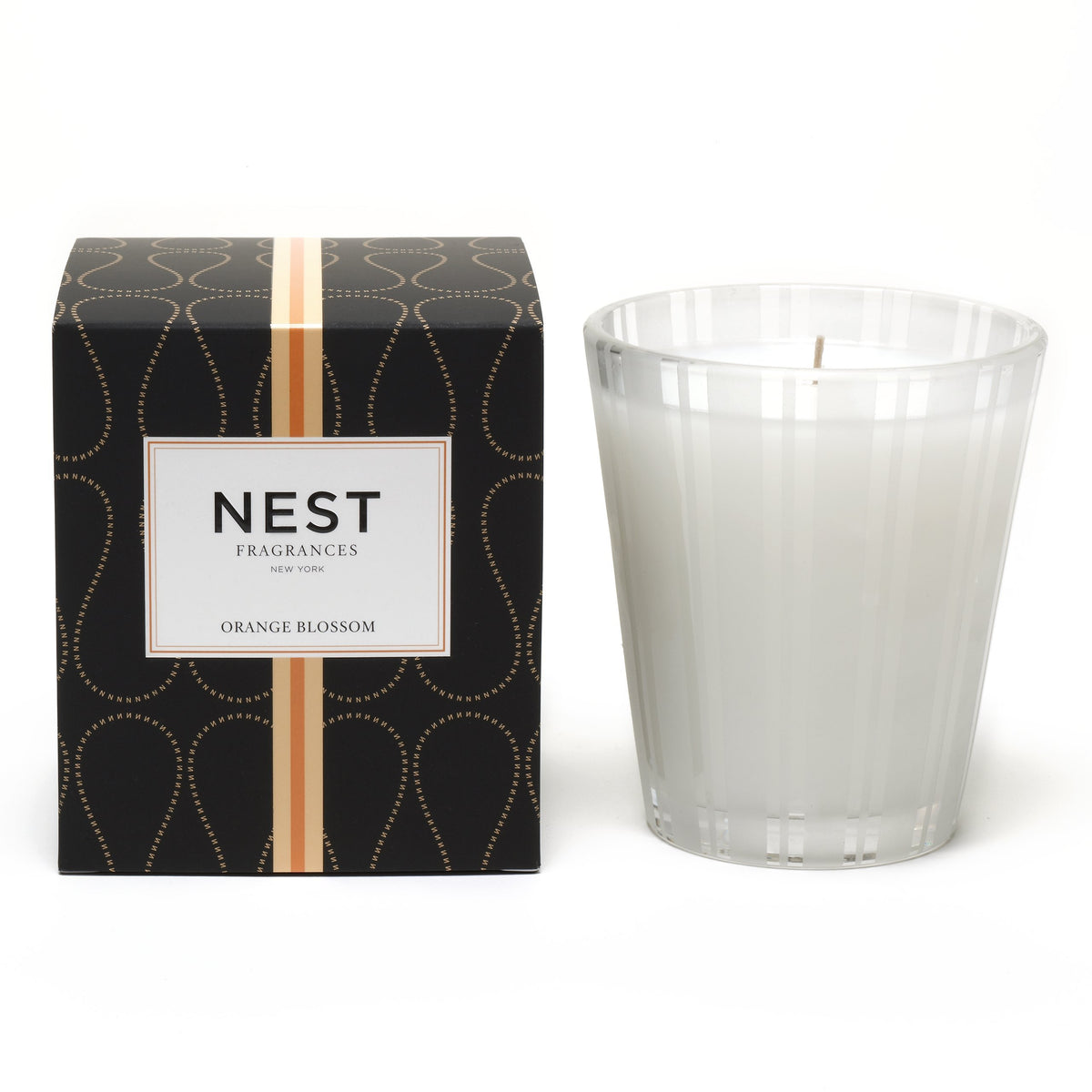 Nest Orange Blossom Classic Candle illuminates spaces with a floral citrus scent for elevated ambience.