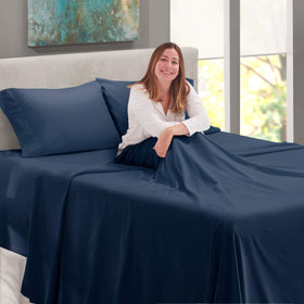 Nestl King Size Sheet Set navy blue fabric adds elegant bedroom detail.