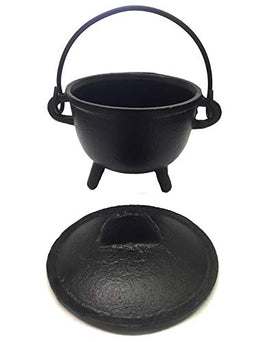 New Age Imports cast iron cauldron with handle and lid, sturdy front view for ritual use.