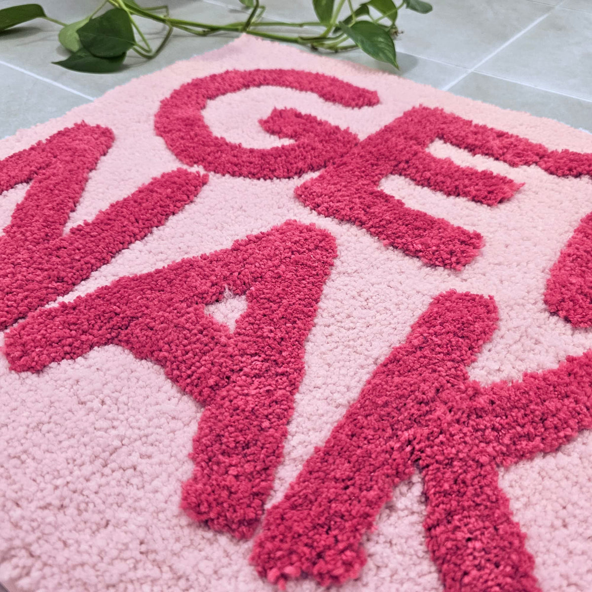 New Mungo Get Naked pink bath mat sized 31 by 20 inches