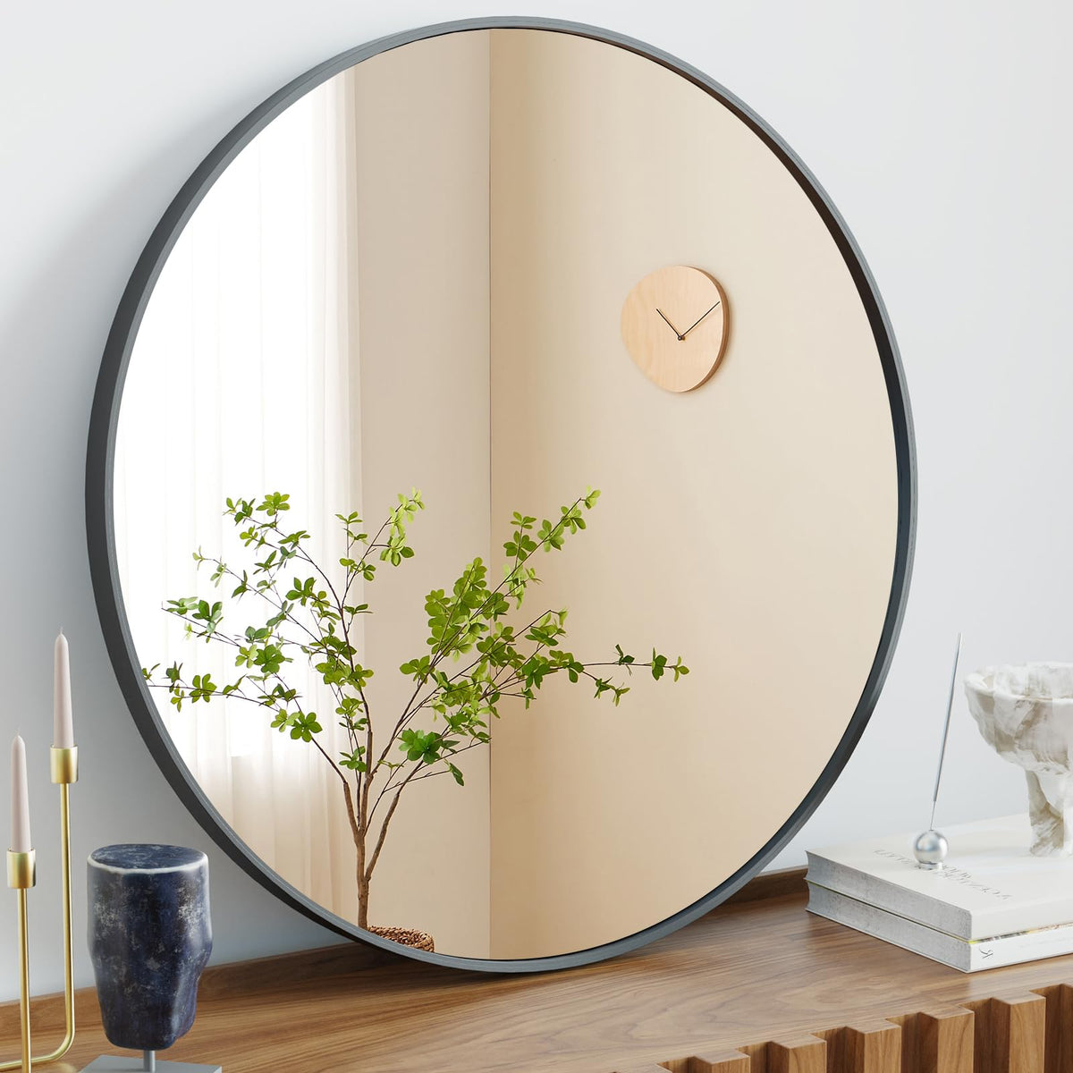 NEWBULIG round bathroom mirror 30-inch black frame provides crisp reflections.