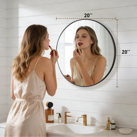NEWBULIG round bathroom mirror with black frame enhances bathroom lighting and space.
