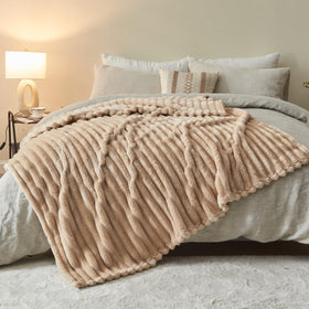 NEWCOSPLAY all-season twin blanket in use for cool nights.