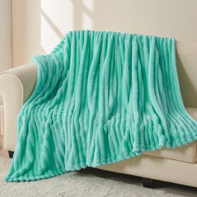 Newcosplay Aqua Ribbed Throw Blanket on sofa adding style and protection