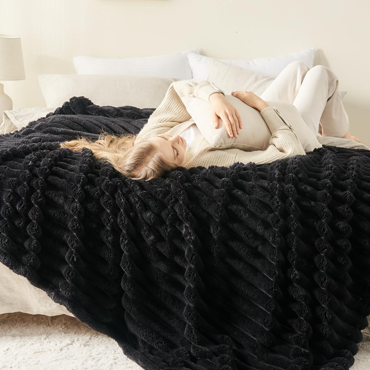 NewCosplay black ribbed twin blanket draped over bed for warm bedroom ambiance