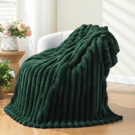 NEWCOSPLAY dark green ribbed throw on bed showing cozy warmth and texture