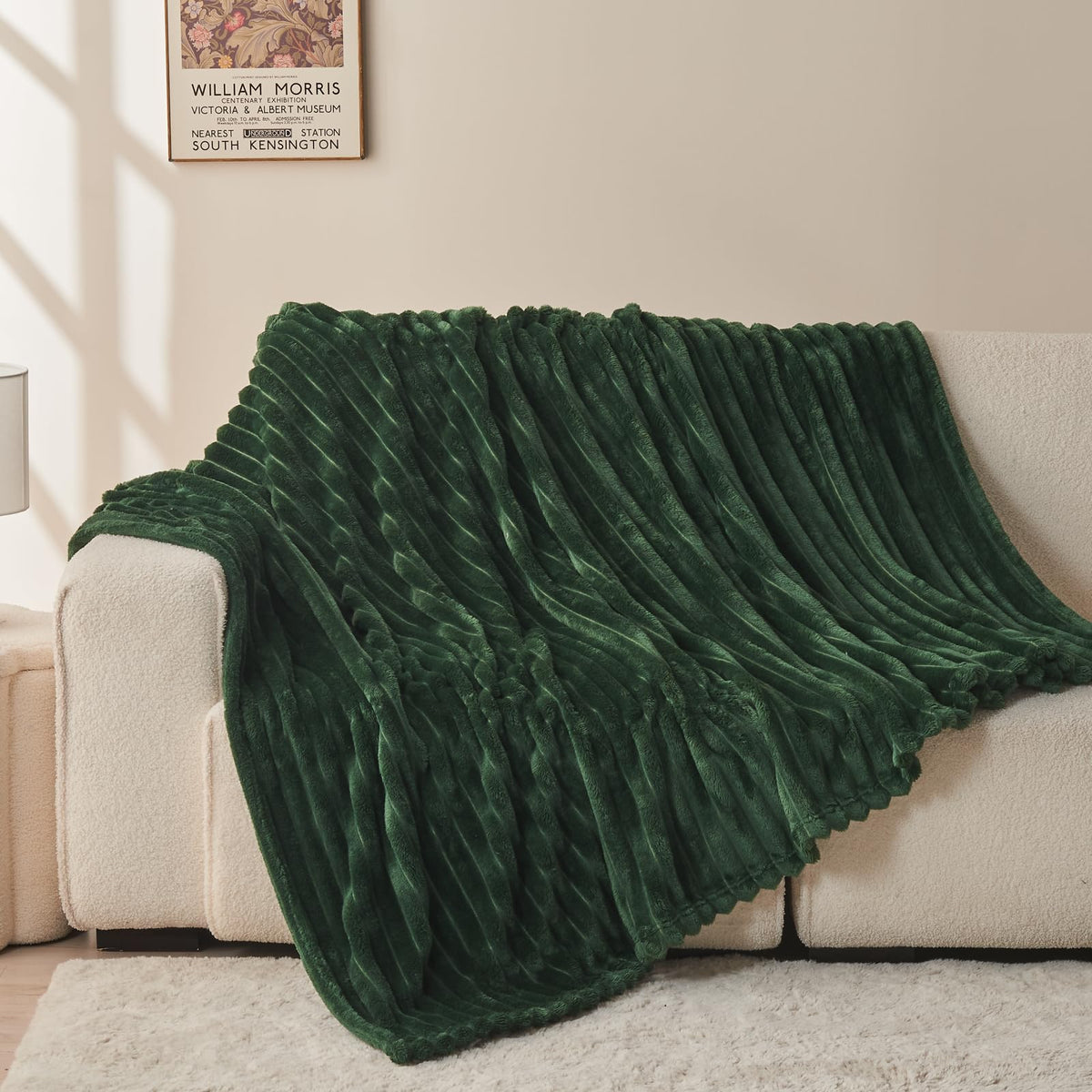 NEWCOSPLAY lifestyle shot of dark green ribbed throw for all-season warmth