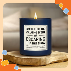 NewEleven cedar-scented candle in blue jar adds cozy ambiance at home or office.