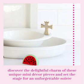 Ceramic base with hole displaying interchangeable Nora Fleming mini