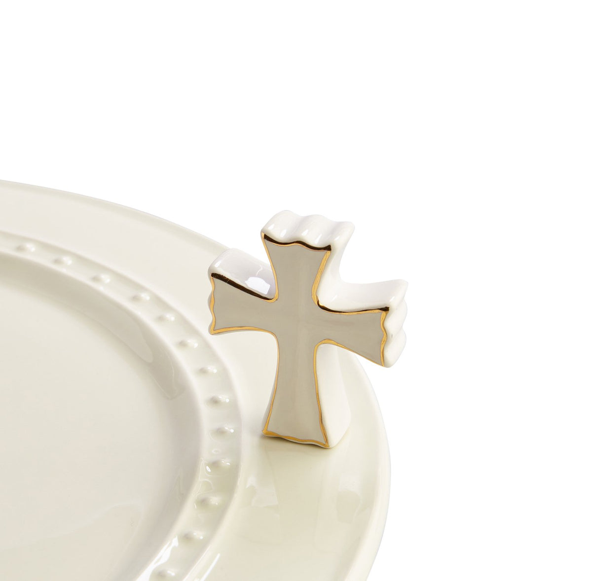 Nora Fleming Cross hand-painted mini on ceramic base, ideal for seasonal home decor